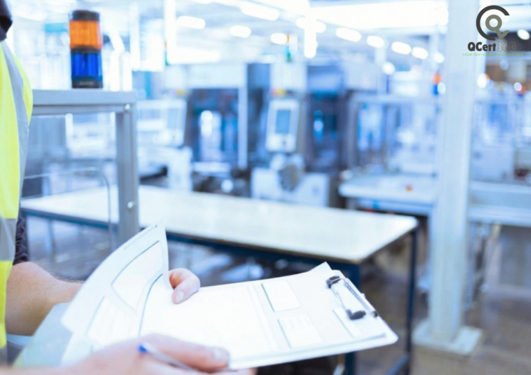 Business professional reviewing ISO 9001 quality management documentation for certification compliance